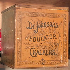 Boîte à craquelins Educator Dr. Johnson&#39;s vintage : contenant publicitaire à couvercle à charnière
