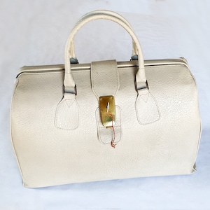 Vintage travel bag with key lockable 1960s leather beige grey