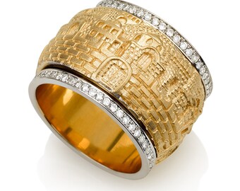May include: A gold and white ring with a textured design of a city wall and a row of diamonds around the band.
