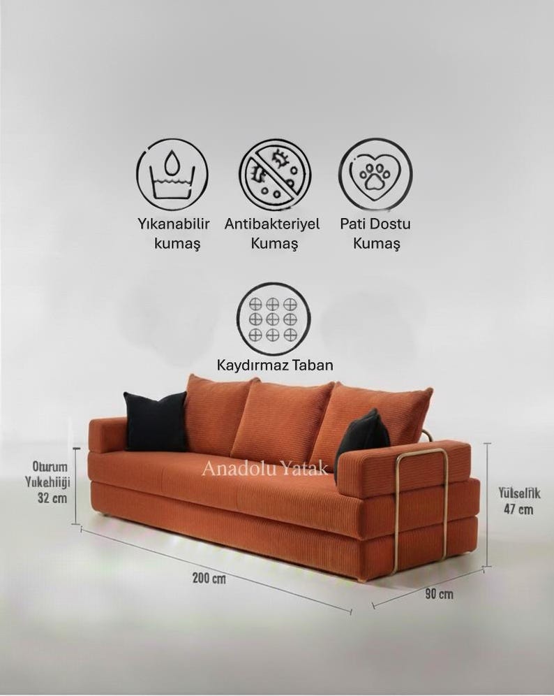 May include: An orange corduroy sofa with black throw pillows. The sofa is 200 cm long, 90 cm wide, and 47 cm high. The seat height is 32 cm. The text "Anadolu Yatak" is visible on the sofa.