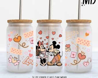 May include: A 16 ounce glass can wrap featuring Mickey Mouse and Minnie Mouse in a romantic pose with hearts and other love-themed designs. The wrap is designed for a Libbey glass can.