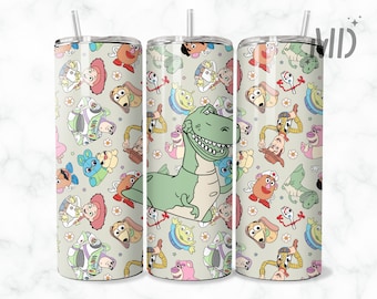 May include: A white tumbler with a green dinosaur, a cowboy, and other characters from the Toy Story movie franchise. The tumbler has a straw and a lid.
