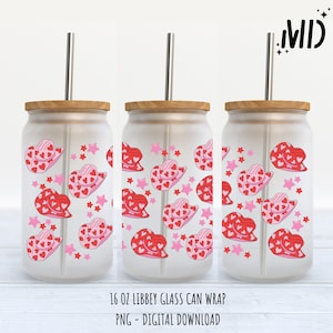 May include: Three 16 ounce glass can wraps with a design of pink and red cowboy hats with hearts and pink stars. The wraps are designed to fit a standard 16 ounce glass can.