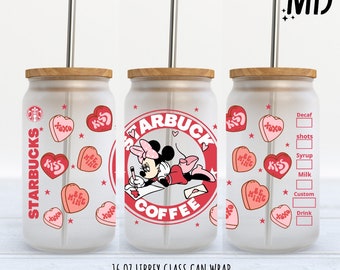May include: A 16 ounce glass can wrap featuring a red and white illustration of Mickey Mouse in a red dress with a bow, writing a letter. The design includes the text "Starbucks Coffee" in a red circle with white stars. The background features pink and red candy hearts with the text "Kiss", "Be Mine", and "XOXO".