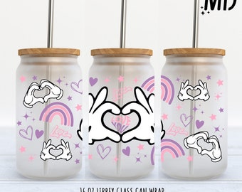 May include: A digital download for a 16 ounce glass can wrap featuring a pink and purple design with Mickey Mouse hands making a heart shape, rainbows, stars, and hearts. The text "Love" is included in the design.