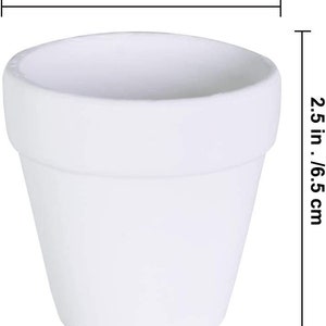 May include: A small, white ceramic flower pot, 2.5 inches in height and width. The pot has a classic, rounded shape with a slightly flared rim. Ideal for small plants or succulents.
