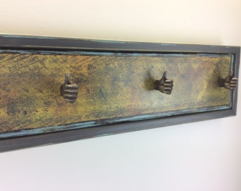 Handmade hand painted unique wall hooks with cast iron hands
