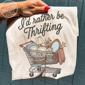 I’d Rather Be Thrifting PNG, thrift aesthetic shirt design, blue and gold vintage decor cart, retro thrifting graphic,boutique style digital
