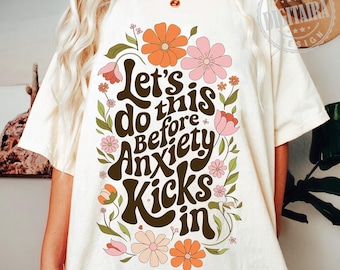 Let's do this before anxiety kicks in Png | Retro shirt print Png | Mental health humor Png | Funny anxiety quote Png | Retro flower design