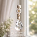 Handgemachter Sonnenfänger Kristall 38mm – Fensterdeko Gänseblümchen mit Holz- & Silikonperlen product logo