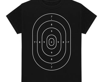 May include: Black t-shirt with a white target printed on the front. The target has concentric circles with numbers 7, 8, and 9 printed around the circles. The center of the target has an X.