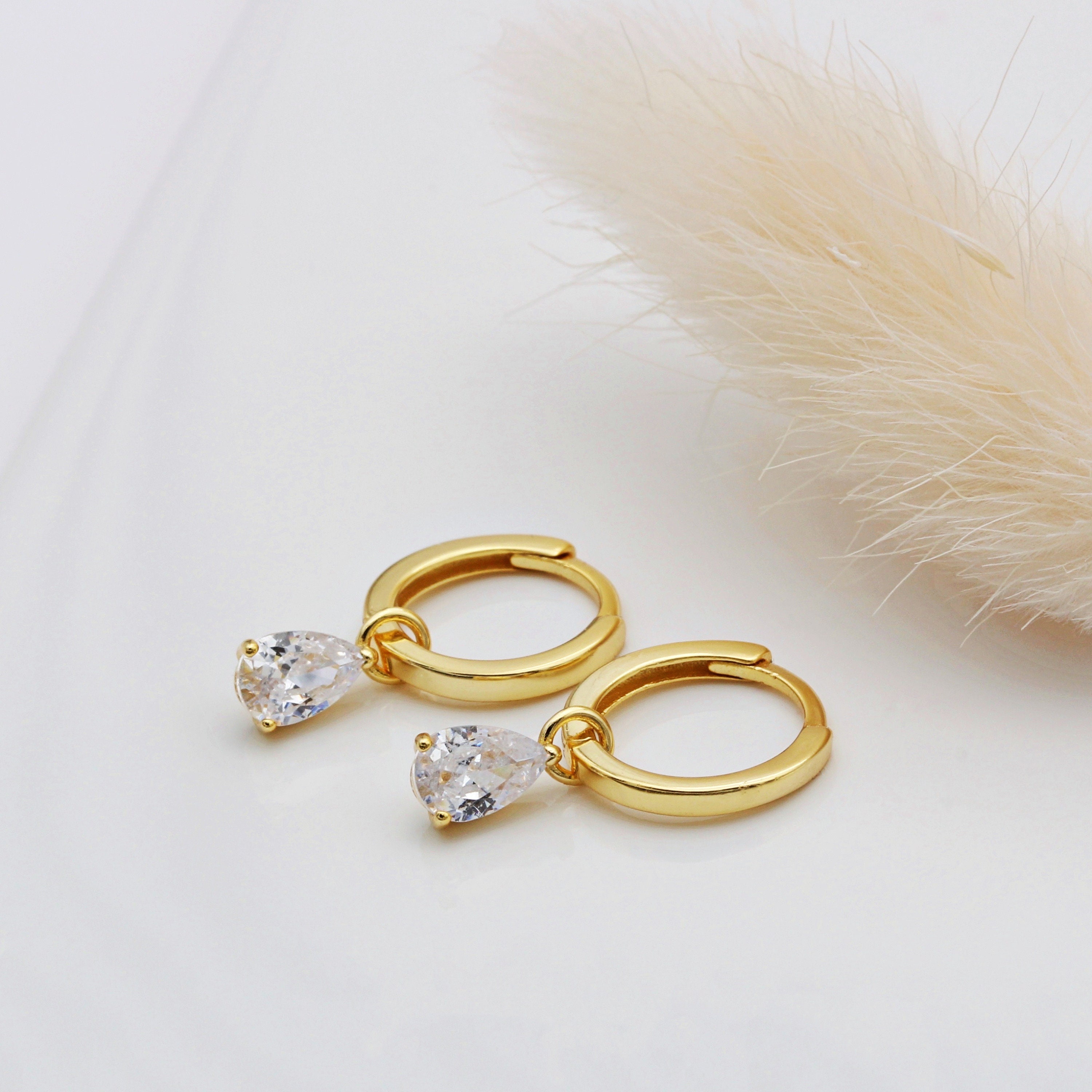 ピアス STONEHENgE 14k ribbon cubic earrings Amazon.com: Dainty Stud Earrings 16G, Cubic Zirconia Flat