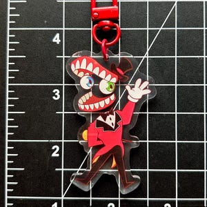 The Amazing Digital Circus Charms (double sided) (Pomni, Jax, Ragatha, Kinger, Zooble, Gangle, and Caine) Caine