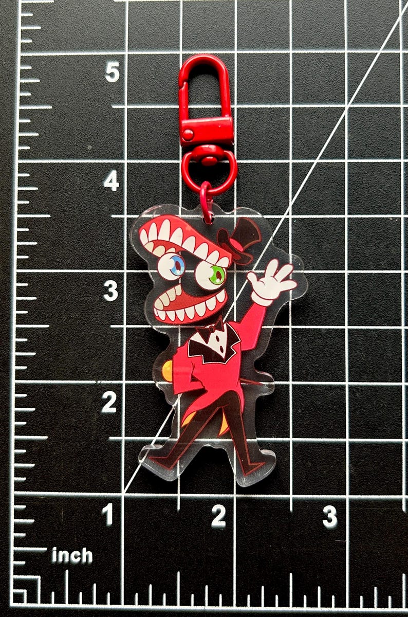 The Amazing Digital Circus Charms (double sided) (Pomni, Jax, Ragatha, Kinger, Zooble, Gangle, and Caine) Caine