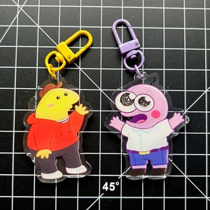 Smiling Friends Charlie and Pim double-sided Charm Keychains