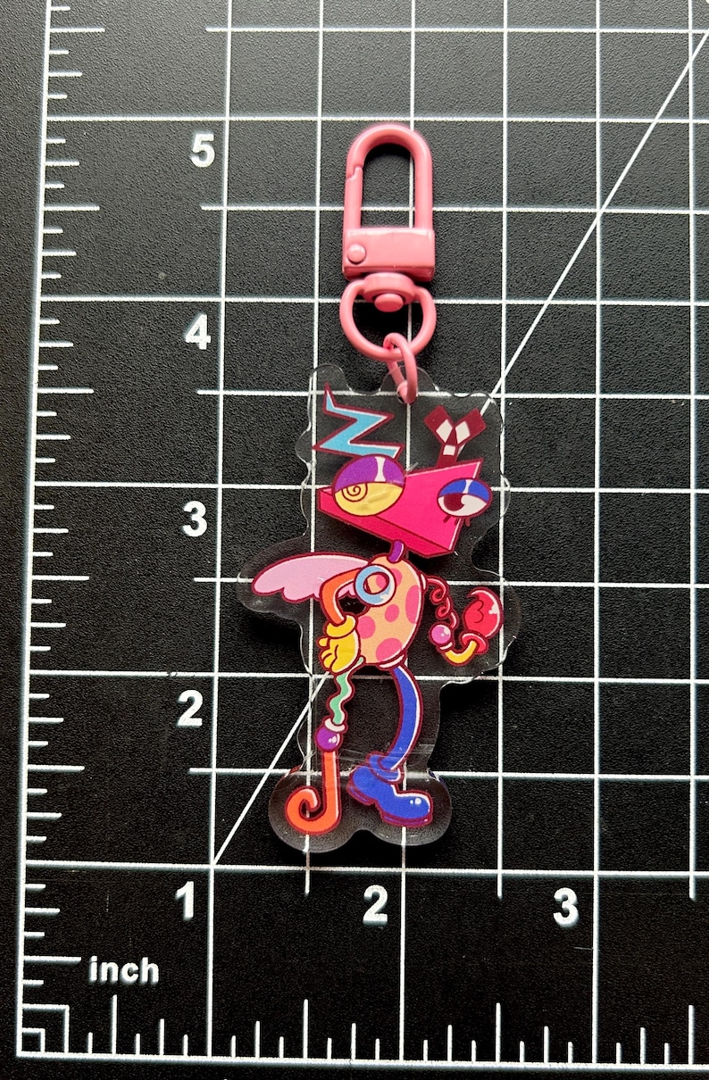 The Amazing Digital Circus Charms (double sided) (Pomni, Jax, Ragatha, Kinger, Zooble, Gangle, and Caine) Zooble