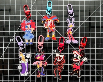 The Amazing Digital Circus Charms (double sided) (Pomni, Jax, Ragatha, Kinger, Zooble, Gangle, and Caine)