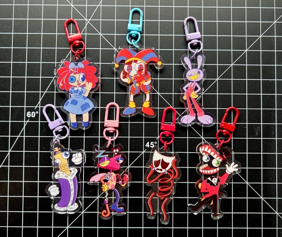 The Amazing Digital Circus Charms (double sided) (Pomni, Jax, Ragatha, Kinger, Zooble, Gangle, and Caine)