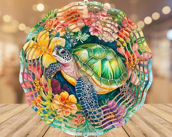May include: A metal wind spinner with a colorful design featuring a sea turtle surrounded by flowers. The turtle is green, blue, and brown, and the flowers are pink, yellow, and purple.