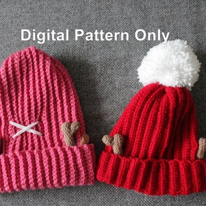 May include: Two crocheted reindeer hats, one pink and one red with a white pom pom.  The hats have brown crocheted antlers and a white stitched X on the pink hat.  Digital Pattern Only.