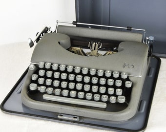 Japy draagbare azerty typemachine geïntegreerde draagtas 1950 /Japy draagbare azerty typemachine geïntegreerde draagtas 1950 vintage