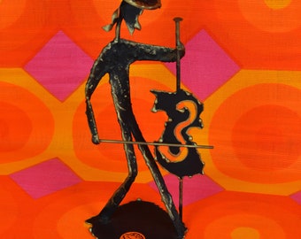 Modern sculpture of cello player in black and gilding / Modern artisanal sculpture of cello player in black and gilding
