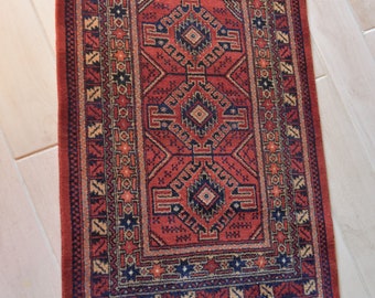 Louis de Poortere vintage wool red-burgundy fringed carpet / Louis de Poortere vintage wool red-burgundy fringed carpet