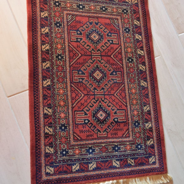 Tapis à franges rouge-bordeaux Louis de Poortere laine vintage / Louis de Poortere vintage wool red-burgundy fringed carpet