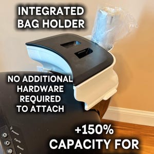 May include: A black and white litter box system with an integrated bag holder. The text on the image reads "Integrated Bag Holder", "No Additional Hardware Required to Attach", and "+150% Capacity for Litterhopper". A roll of bags is visible.