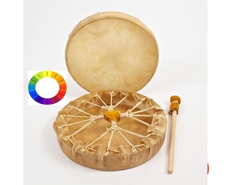 May include: A brown leather hand drum with a wooden frame and a wooden beater. The drum is open and the leather is stretched over the frame. The beater has a brown leather head.