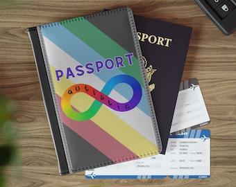 May include: A passport holder with a rainbow infinity symbol and the text "autistic" inside the symbol. The holder has a black background with a multi-colored striped pattern.