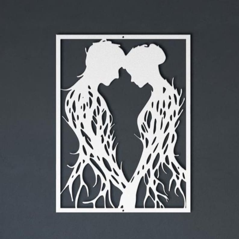 May include: White metal wall art depicting two figures in profile, their heads touching. The figures' bodies are formed by intricate, branch-like patterns, set within a rectangular frame. The artwork is a minimalist representation of connection and intimacy.