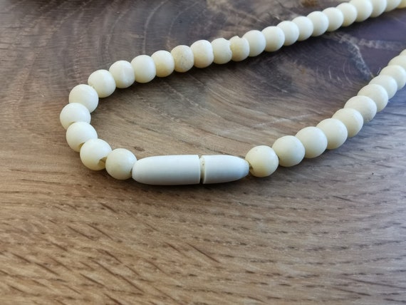 Antique short necklace of carved bone beads strun… - image 3