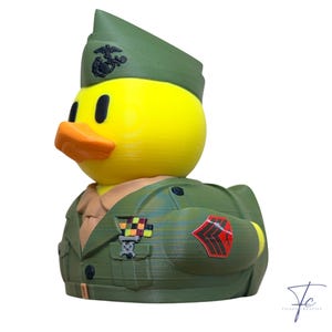 May include: A set of three ceramic mugs with a speckled, matte finish. The mugs are in shades of cream, light gray, and dark gray. Each mug has a simple, minimalist design and a rounded handle.