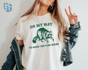 Funny Raccoon Graphic Tee, "On My Way To Make The Vibe Weird" Shirt