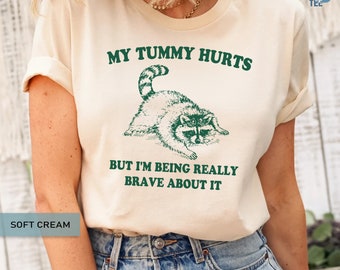 My Tummy Hurts But Im Being Really Brave About It Unisex Crewneck Shirt - Womens Tummy Hurts Racoon Shirt