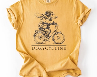 Doxycycline T-Shirt: Dachshund on Bicycle, Pharmacy Pun