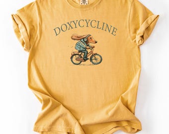 Doxycycline Dachshund Bicycle T-Shirt: Funny Pharmacy Tee