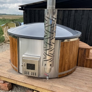 Fibreglass wooden tub with integrated oven