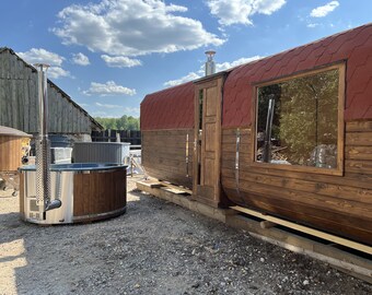 6.0 m rectangular sauna with lounge + matching hot tub. Perfect interior for your garden or the backyard.