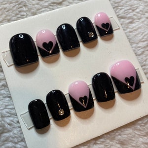 High quality black and nude/pink  hand painted Press On Nails with heart accents.