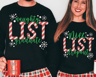 May include: Two black sweatshirts with red and white candy cane stripes. The text on the sweatshirts reads "naughty list graduate" and "nice list dropout".