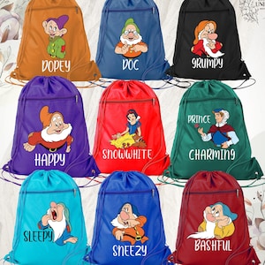 May include: Set of 10 drawstring bags featuring characters from Snow White and the Seven Dwarfs. The bags are in various colors, including red, blue, green, purple, orange, and black. Each bag features a different character, including Snow White, Doc, Grumpy, Happy, Sleepy, Sneezy, Bashful, Dopey, Prince Charming, and a white background with the text "Blue Unique Boutique".