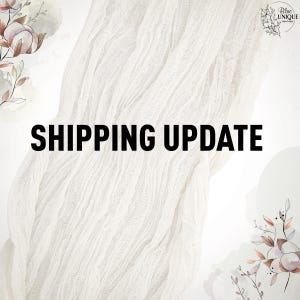 May include: A white textured background with the text "SHIPPING UPDATE" in black bold letters. The background is decorated with watercolor-style floral designs in shades of brown and white.