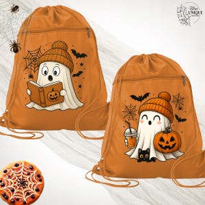May include: Two orange drawstring bags with Halloween-themed designs. One bag features a ghost reading a book with a pumpkin on the cover, wearing an orange beanie. The other bag shows a ghost with a pumpkin, drink, and black cat.
