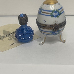 Genuine Limoges box standing egg with French bottle