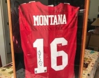 Joe Montana Collection - Autographed Game Jersey, Collectors Ceramic Plate and Statue