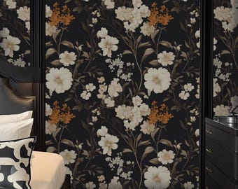 May include: Black wallpaper with a floral pattern featuring white flowers and orange accents. The wallpaper is shown in a bedroom setting with a black headboard and a white bedspread.