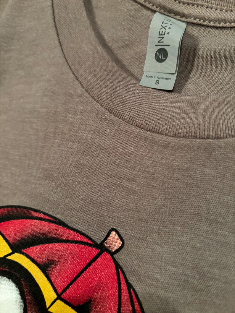 Next Level brand t-shirt with cute ghost with umbrella image