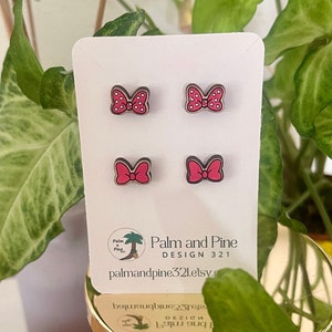May include: A set of four pink and white polka dot bow earrings on a white card with the text "Palm and Pine Design 321 palm and pine321.etsy.com".